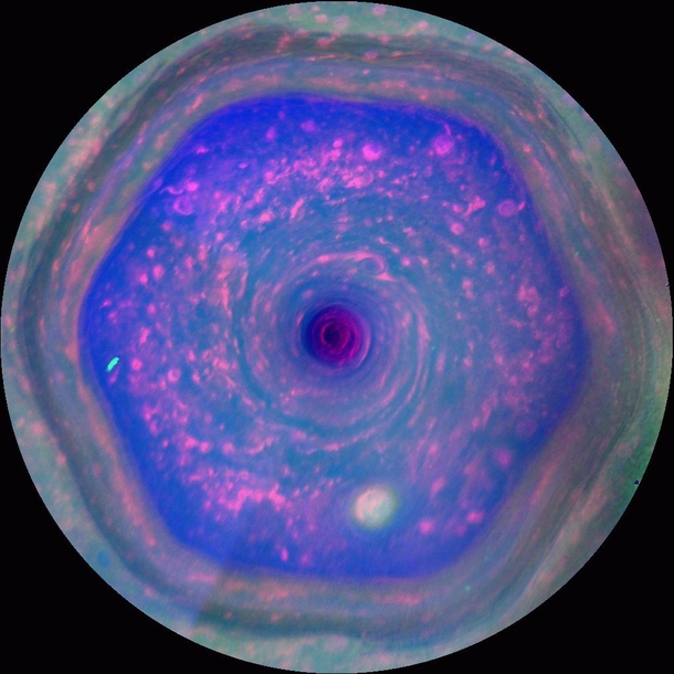This colorful view from NASAs Cassini mission is the highest-resolution view of the unique six-sided jet stream at Saturns north pole known as the hexagon 