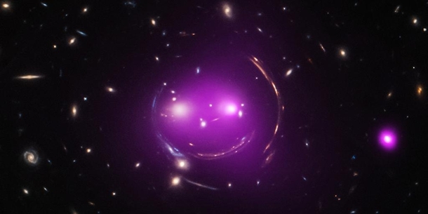 This group of galaxies is nicknamed the Cheshire Cat due to its resemblance to a smiling feline Some of the features are actually distant galaxies whose light has been stretchedbent by large amounts of mass contained in foreground galaxies NASA Chandra X-
