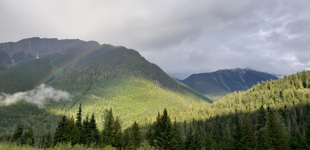 This rainbow coming out of a cloud after a rainy day in British Columbia 