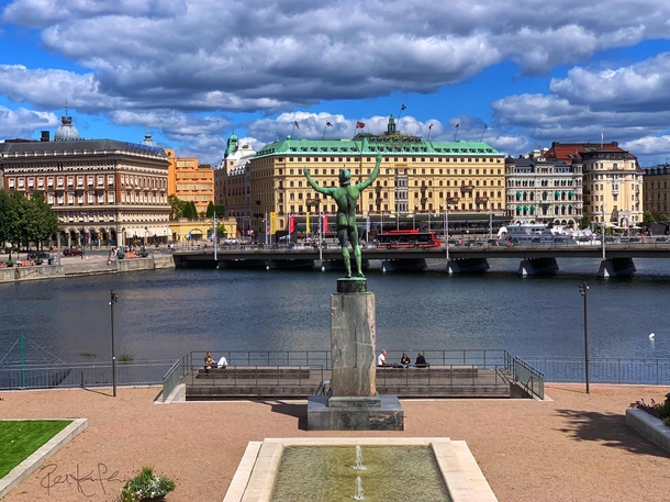 This statue of Apollo the Greek god of the sun poetry and music appears to be flashing the city of Stockholm Sweden because he is naked except for his helmet 