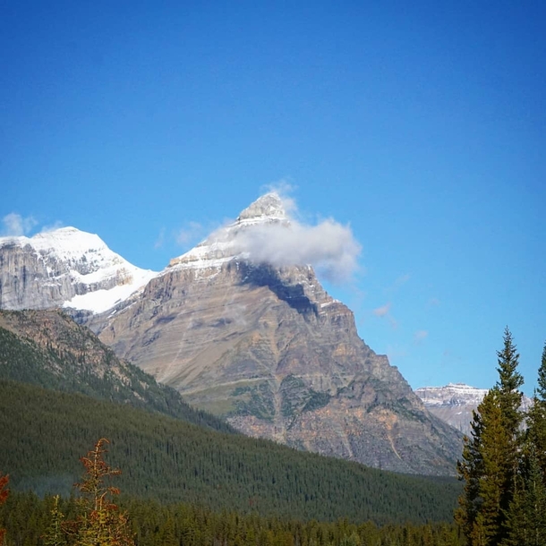 This triangular mountain and his cloud friend in Banff NP Canada