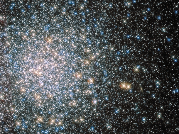 Though it appeared to Messier to be fuzzy and round and without stars Messier  M is now known to be a globular star cluster  stars or more bound by gravity and packed into a region around  light-years in diameter 