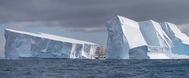Three-masted Barque Europa navigates gigantic icebergs during an expedition to Antarctica a month ago For scale the ship is m ft long and m ft tall 