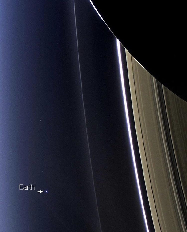 Through Saturns rings Earth shines at a distance of  million miles