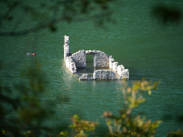 Took a photo of a diver taking a photo ruins in Tramonti di Sotto Italy 