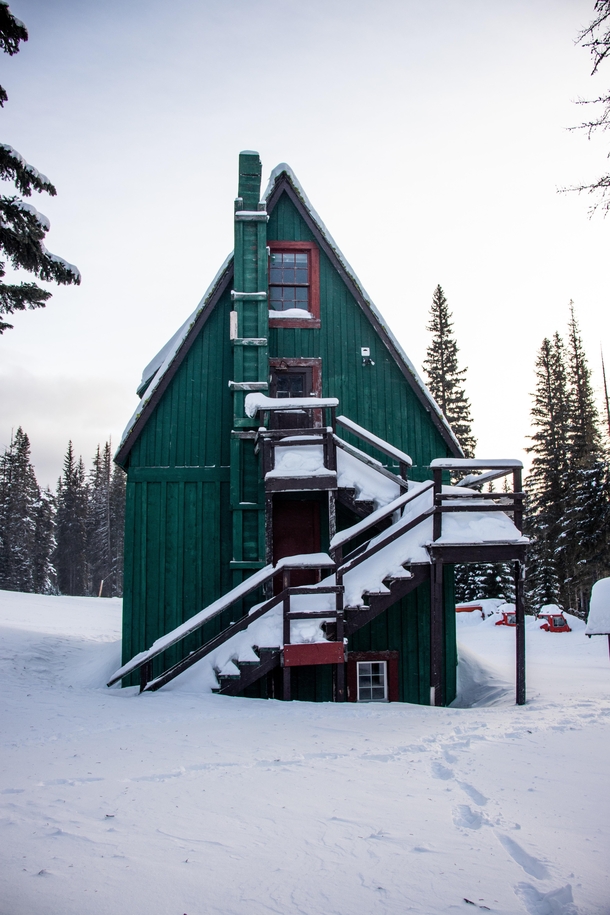 Took a picture of a lodge at an abandoned ski resort