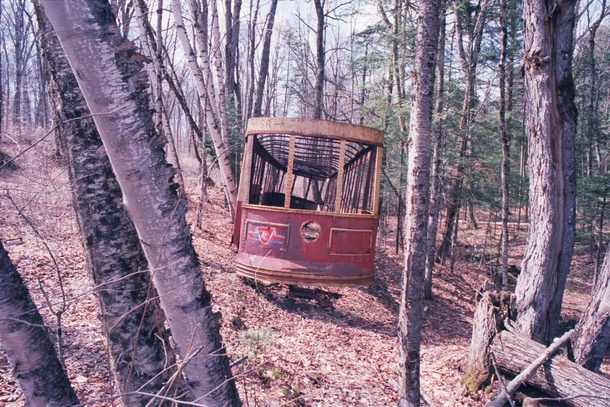 Toronto streetcar in a remote forest of northern Ontario Photographed with Ektar  film hence the reddish hue