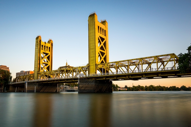 Tower Bridge opened in  is a vertical lift bridge in Sacramento California The effect of having an architect guiding the design process is strikingly obvious with this bridges unique and pleasing appearance that has a strong Streamline Moderne influence w