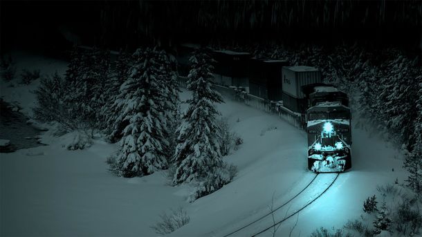 Train travelling through snowy forest at night  x-post wallpapers