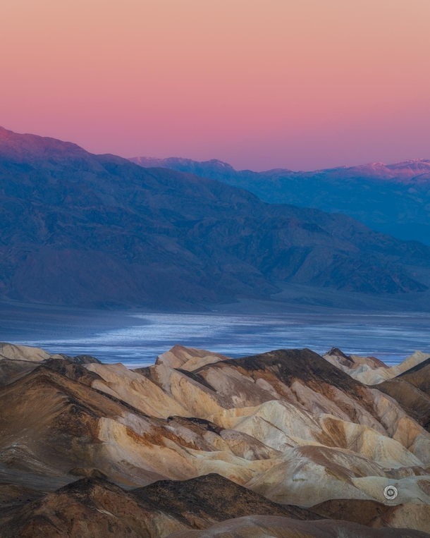 Twilight over the badlands of Death Valley California 