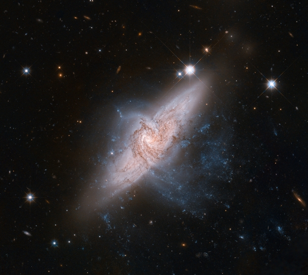Two Galaxies Separated by Tens of Millions of Light Years but Appear to be Colliding Due to Forced Perspective 
