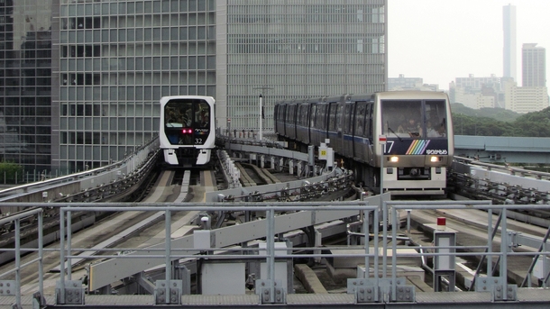 Two generations of rolling stock on Tokyos Yurikamome fully automated people mover system 