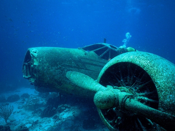 Underwater airplane wreckage presumably WWII era location and photographer unknown 