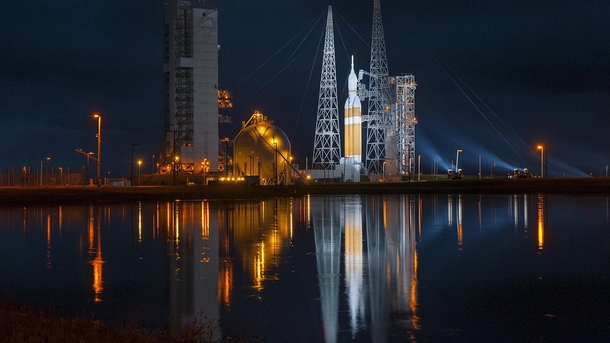 United Launch Alliance Delta IV Heavy rocket with the Orion spacecraft on top awaiting liftoff from Space Launch Complex- 