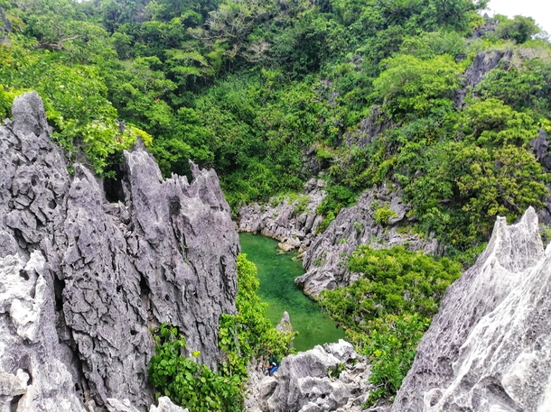 View after wall-climbing such cliffs without any safety harness Matukad Island Caramoan Philippines 