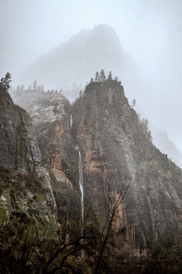 View from the weeping rock Zion National Park during a snowyrainy day 