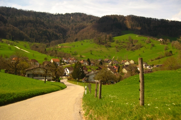 Village of Brschwil Switzerland nestled in the green hills of the Jura Mountains 