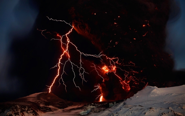 Volcanic lightning storm forming above an erupting volcano in Iceland Lucas Jackson  