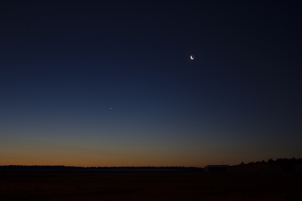 Was at work and grabbed this shot of the moon and Venus about an hour before sunrise Plymouth Airport Massachusetts 