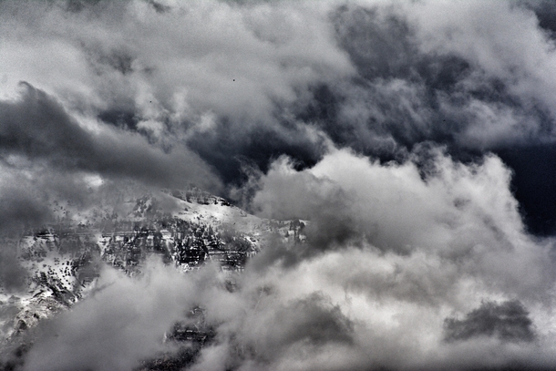 Wasatch Mountains peeking through the cloud cover yesterday  Orem Utah OC x