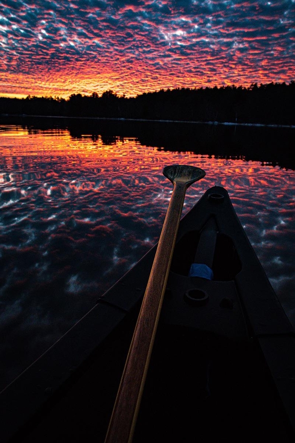 Watching the arresting sunset from a canoe on a river in Maine Happy New Year everyone