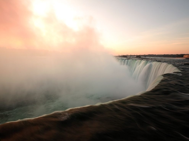 Water rushes over Horseshoe Falls one of the three falls that make up world-famous Niagara Falls Chris Rainier 