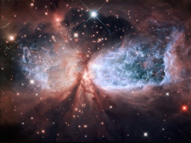 We all deserve to take a moment to space out and get lost among the stars Today your moment is courtesy of a bipolar star-forming region called Sharpless - A huge young star is the cause of most of the action