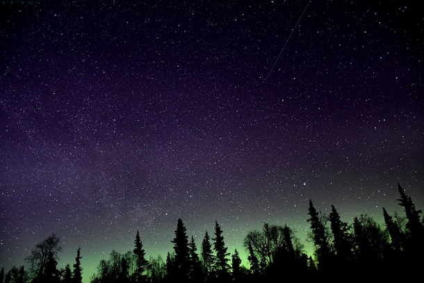 Went out to practice some night shots Ended up getting my first shooting star with the northern lights as a backdrop 
