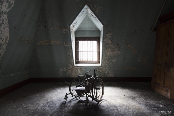Wheelchair Inside an Abandoned State Hospital in New York 