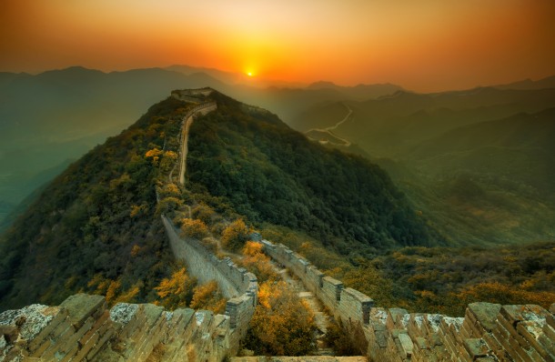When the Earth reclaims the Great Wall of China - vegetation and trees growing on top 