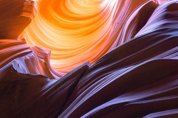 While exploring some slot canyons not named Antelope Canyon my friends and I found this amazing sandstone featurewe waited a few hours for the light to pour in and when it did wow Colorado Plateau USA  mattymeis