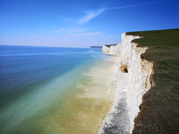 White cliffs and blue sky of Seven Sisters England  x