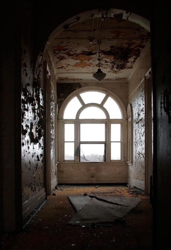 Window in an abandoned psychiatric hospital 