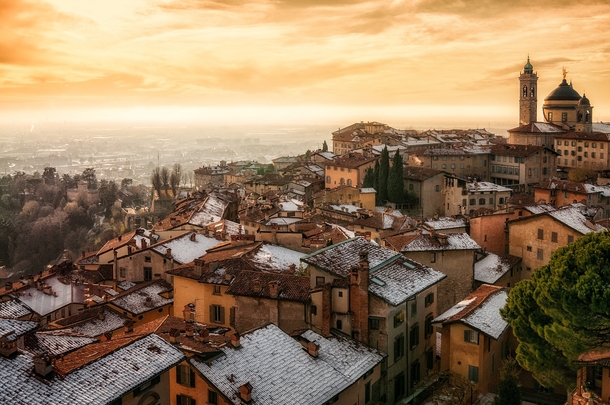 Winter sunset over the upper city of Bergamo northern Italy  xpost from rItalyPhotos