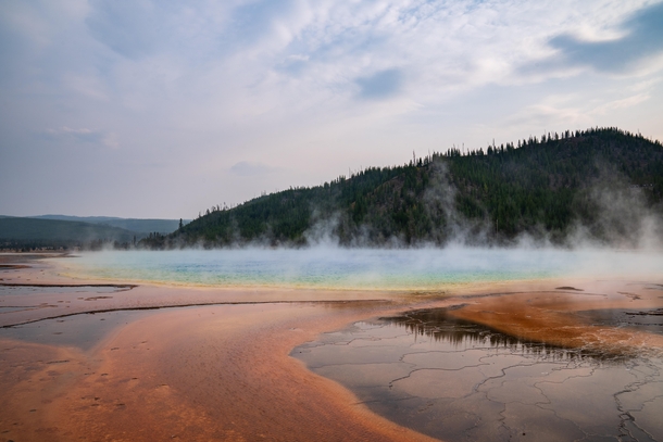 Woke up at AM and walked a tenth of a mile to get this shot Thermal Pools at Yellowstone NP 