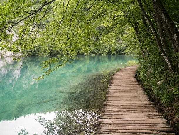 Wooden path by the lake at Plitvice Lakes National Park Croatia 