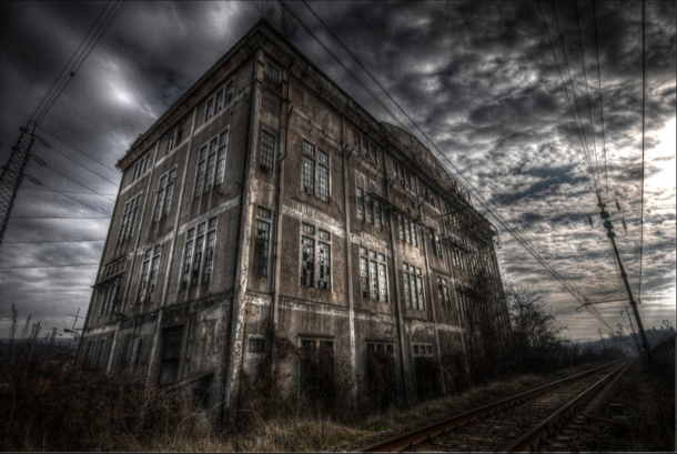 x This is my last post for the day an abandoned steel mill by a railway line
