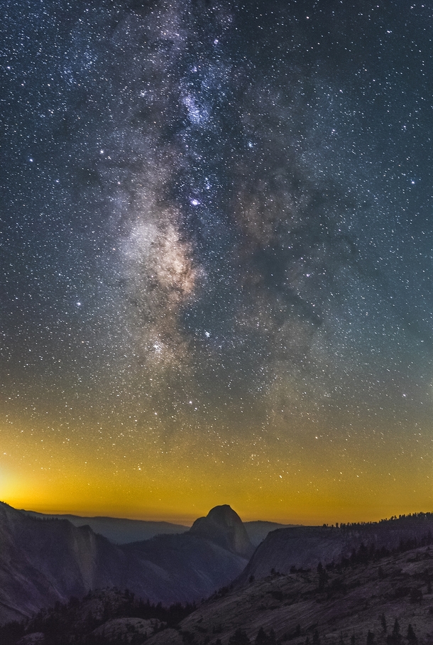 Yosemites Half Dome underneath The Lagoon Nebula and The Galactic Core 