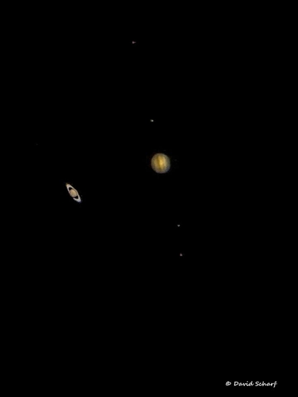 Zooooomed in view of Jupiter its  moons and Saturn