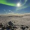 I bring you a very rare pic This is Nunavuts landscape in winter lit by the moon and northern lights above Nunavut Canada 