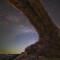 My friend does a little astrophotography here is the North Window from Arches National Park   