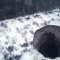 The gates of hell have opened in Russia A potash Mine has collapsed in the Perm region leaving behind a gigantic sinkhole in the middle of an abandoned town 