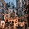 The Gros Horloge a th century astronomical clock installed in a Renaissance arch crossing a street in Rouen Normandy France