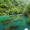 Took a boat ride through the valley of Zhangjiajie China Didnt expect this color 