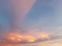  Colorful clouds and the tiny moon