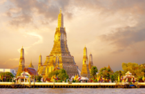  feet high Wat Arun is a Buddhist temple in Bangkok Thailand The temple derives its name from Aruna the charioteer of Surya Sun god in Hinduism The central prang is topped with a seven-pronged trident referred to by many sources as the Trident of Shiva
