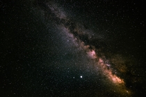 First time getting into astrophotography and I absolutely love it Shot of the Milkyway core with Jupiter and Saturn