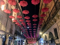  - France - Breast cancer pink umbrellas in the rue de la loge in Montpellier