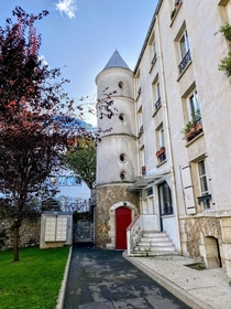  France - Paris  - Corner turret with spiral staircase at  rue du Chevaleret in the courtyard of Liegat