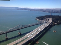  lanes of Interstate  are completely stopped over Labor Day weekend on the old seismically-inadequate San Francisco-Oakland Bay Bridge L while a transition deck is built to direct vehicles onto its replacement the Signature Span a self-anchored suspension